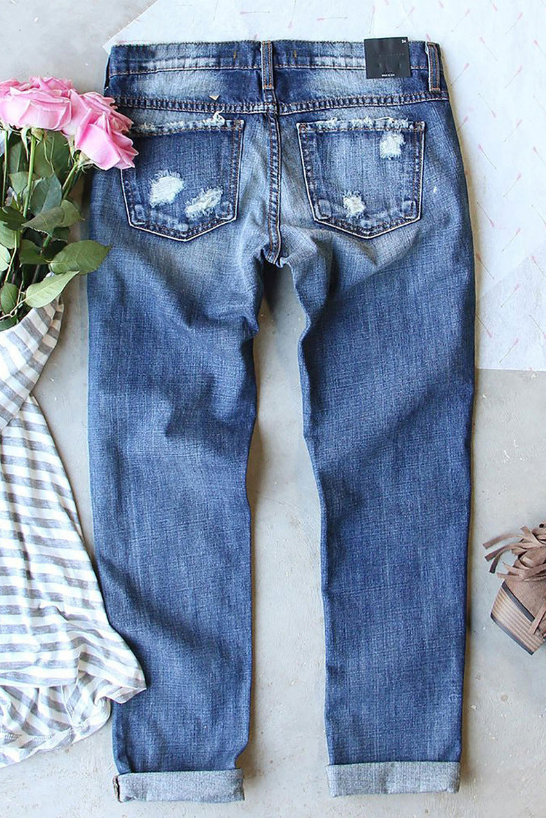 Woman's Middle In Ripped Printed Jeans
