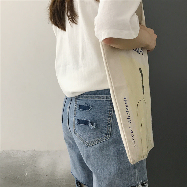 Loose and thin nine-point ripped jeans casual pants